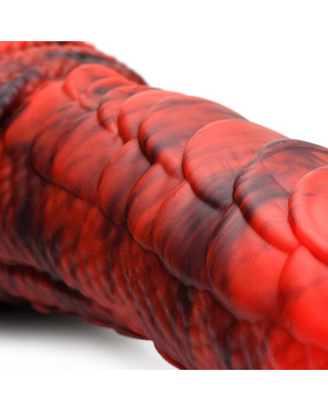 Fire Dragon Red Scaly Silicone Dildo close up on a white background