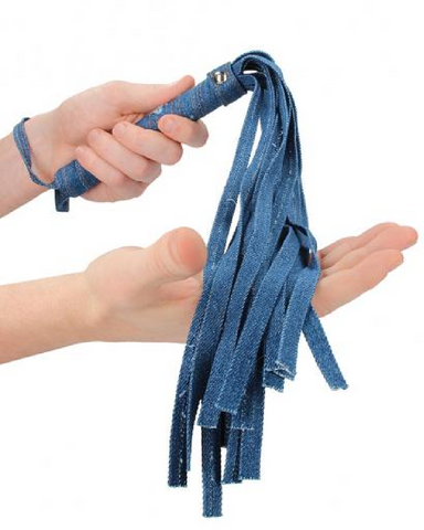Ouch!  Roughend Denim Style Flogger  model holding product 