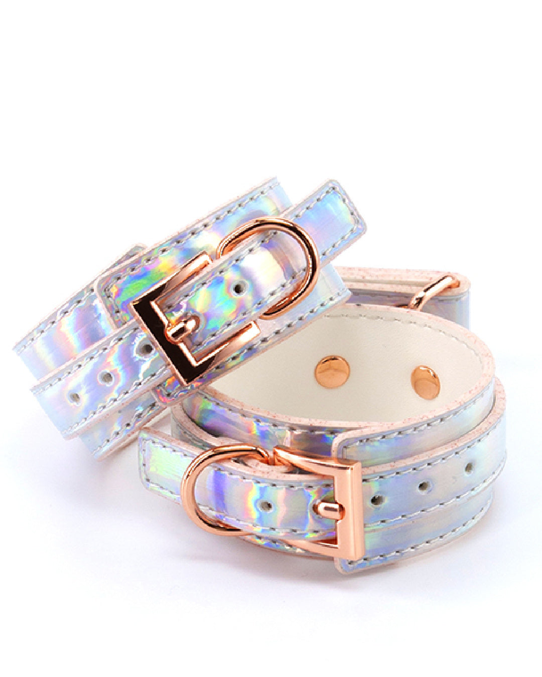 Cosmo Bondage Holographic Ankle Cuffs sitting on top of each other on white background 
